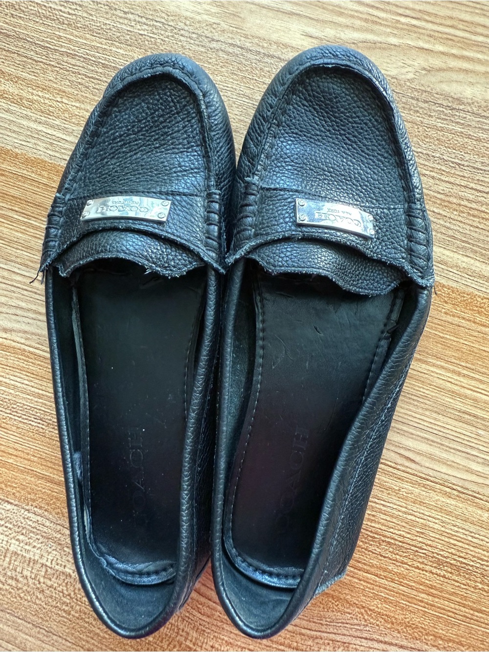 Coach Women’s Black Pebbled Leather Loafers with Silver Plaque, size 9